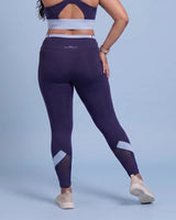 Back view of Navy High-Rise Leggings, showing the fit through the hips and seat.