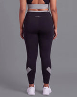 Back view of Black High-Rise Leggings, showing the fit through the hips and seat.